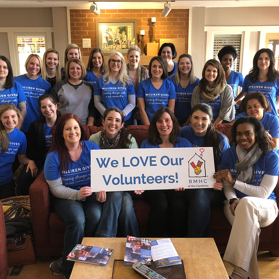 group of volunteers inside house